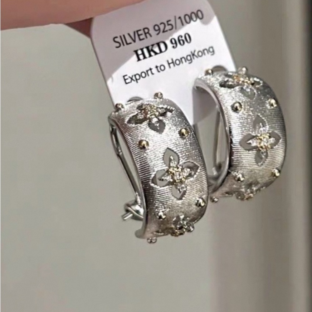 Silver Hoop Earrings with Floral Design and Sparkling Stones